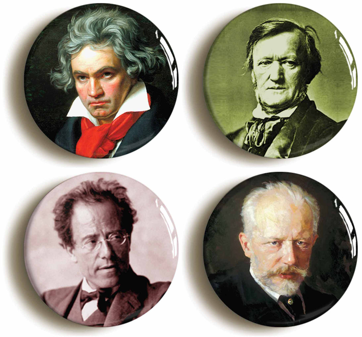 A picture of a set of four badges