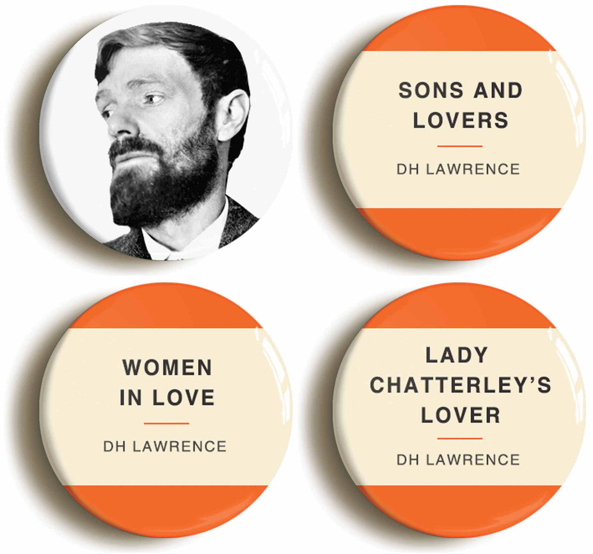 A picture of a set of four badges