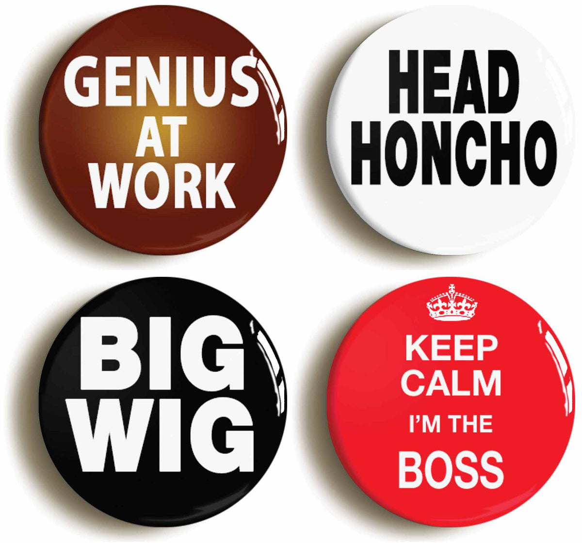 A picture of a set of four badges