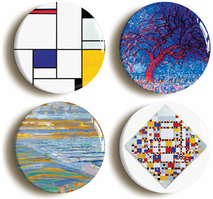 A picture of a set of four badges