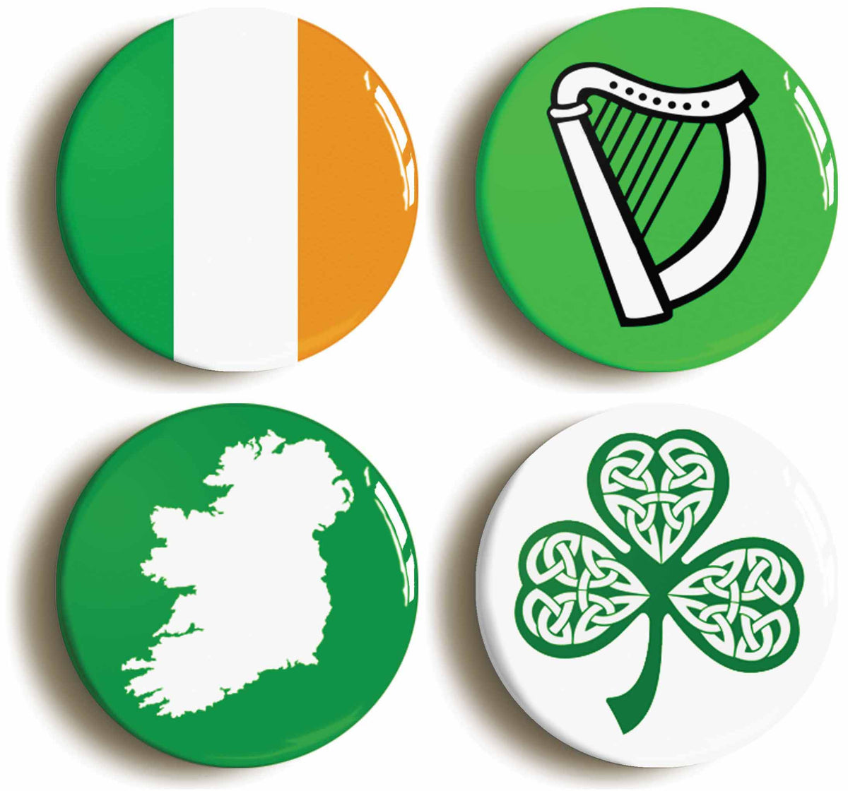 A picture of a set of four badges