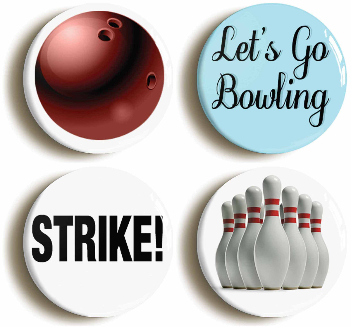 A picture of a set of four badges
