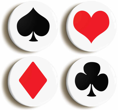 A picture of a set of four badges