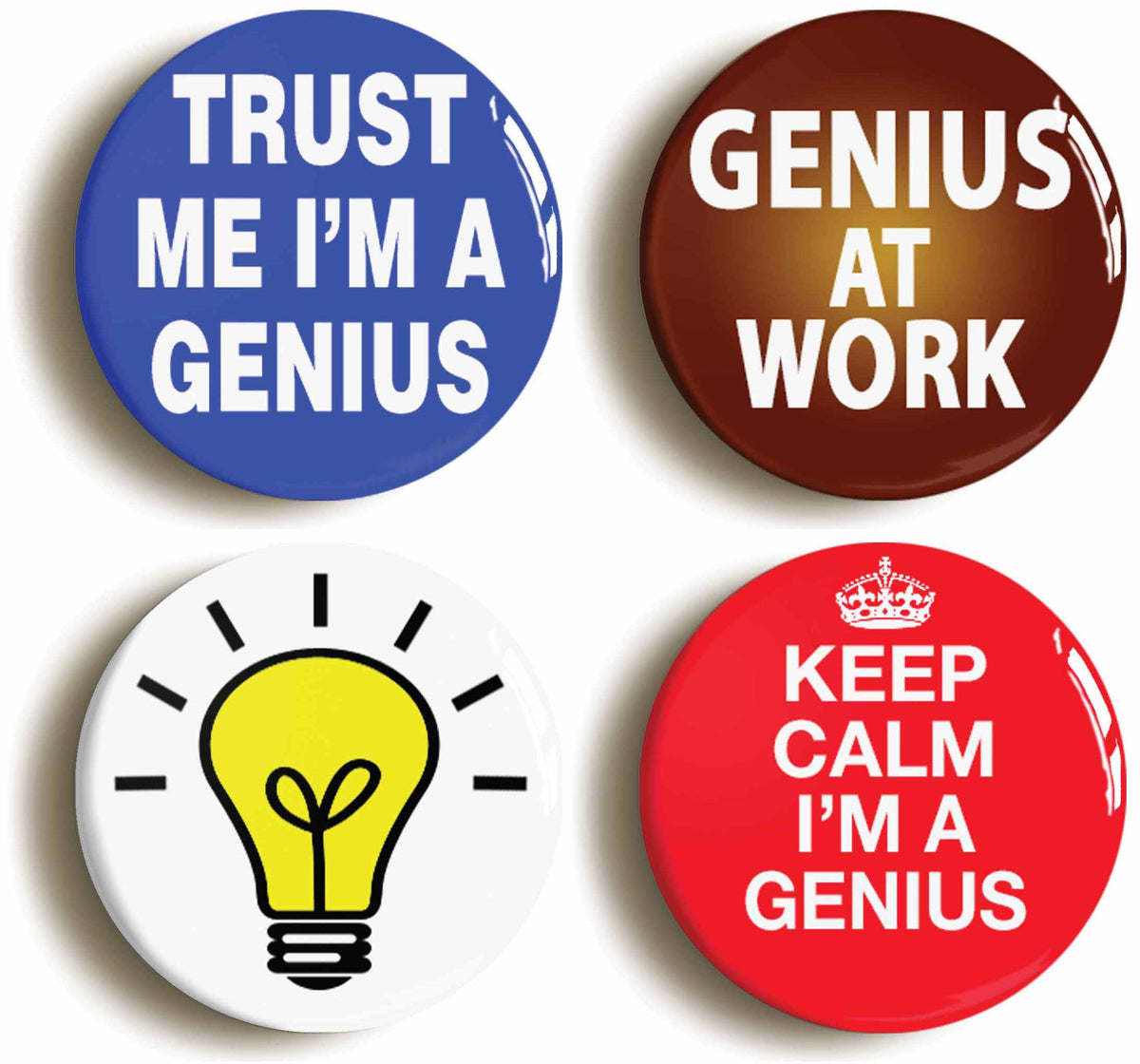 A picture of a set of four badges