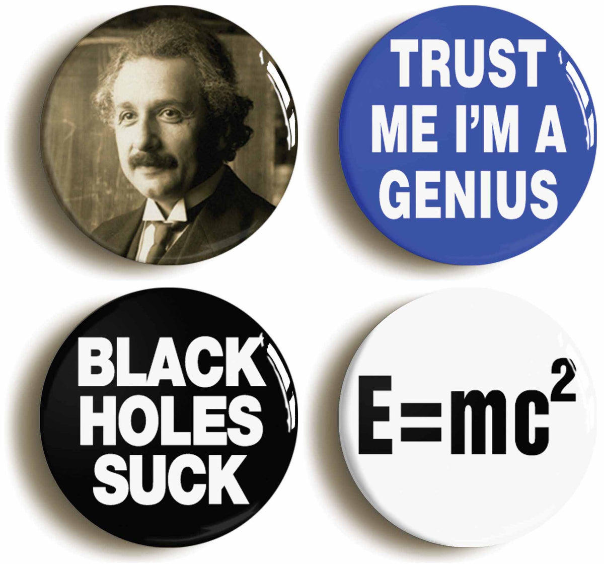 A picture of a set of four badges