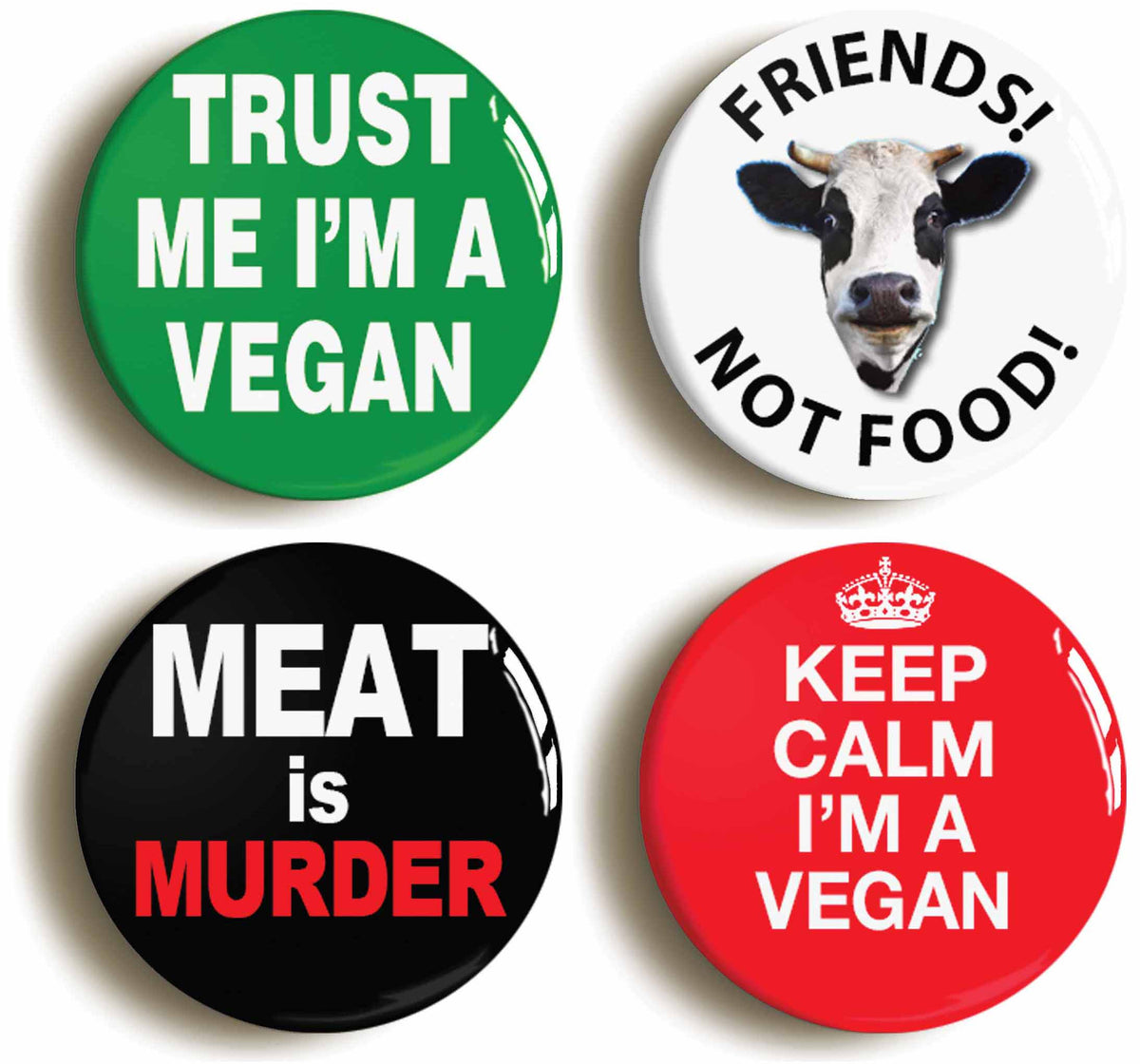 A picture of a set of four badges