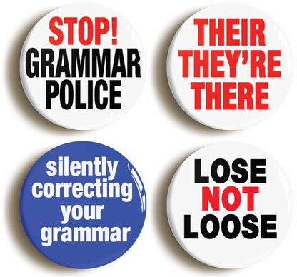 A picture of a set of four badges