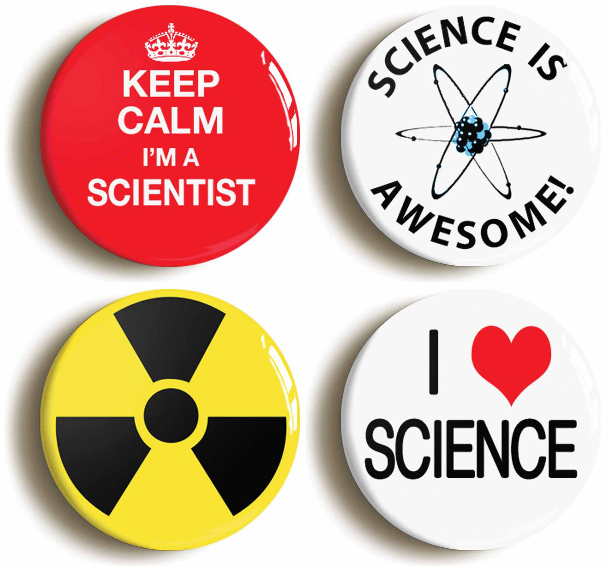 A picture of a set of four badges