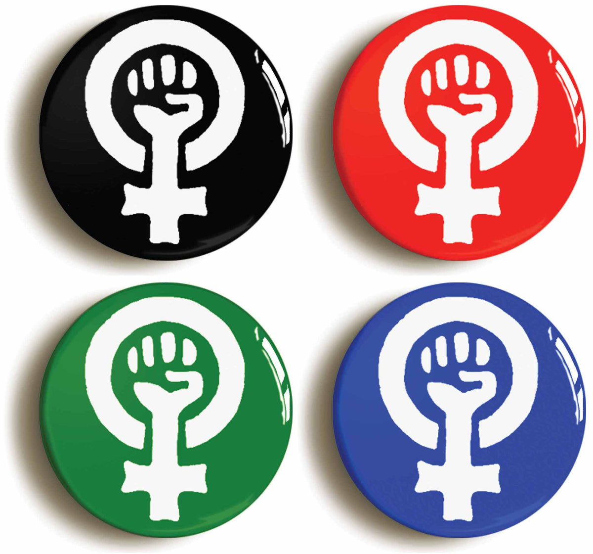 A picture of a set of four badges