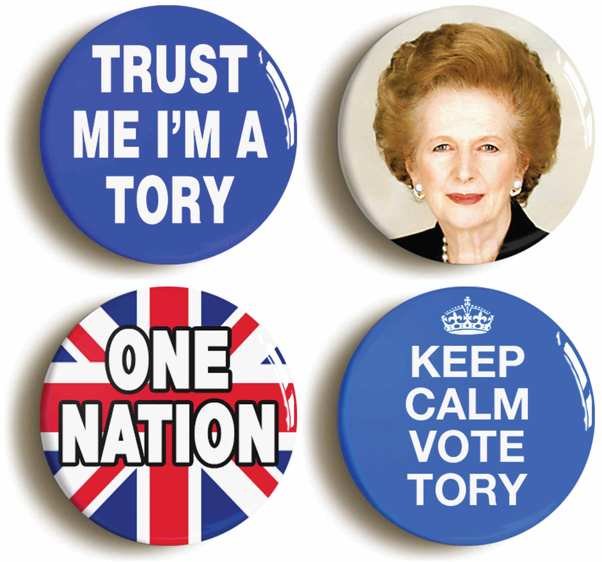 A picture of a set of four badges