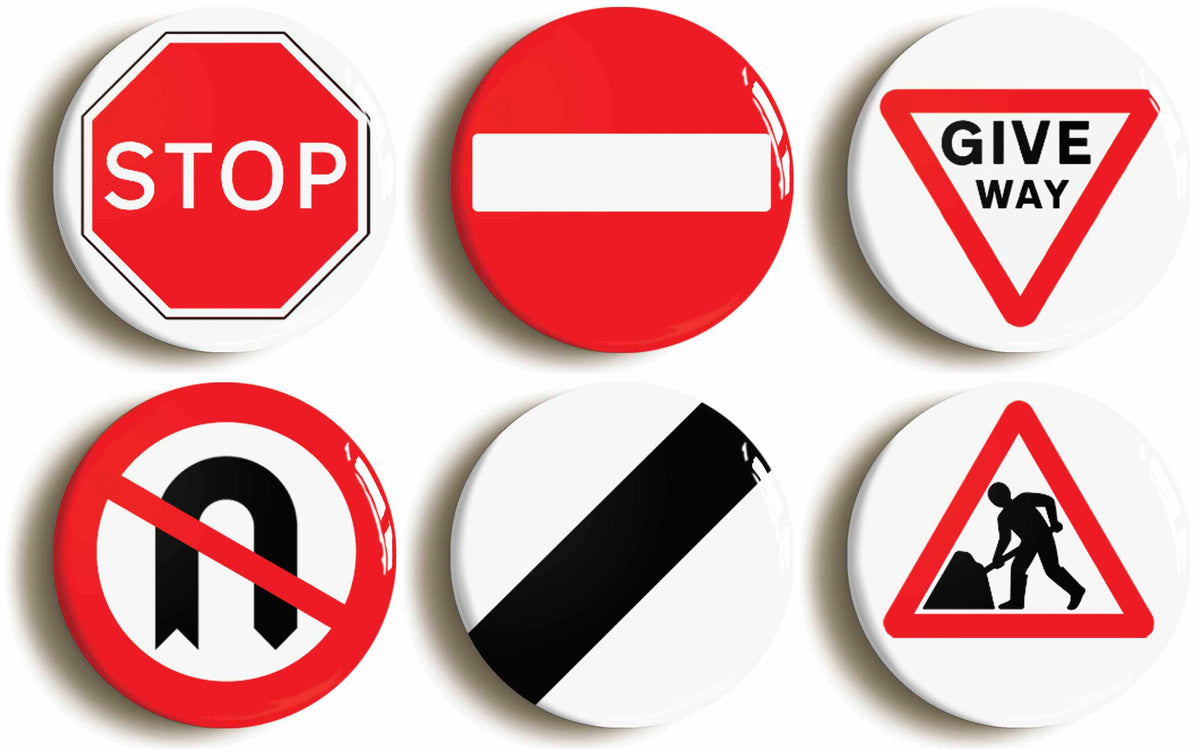 A picture of a set of six badges