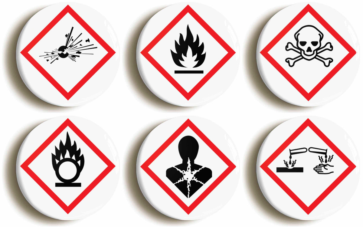 A picture of a set of six badges