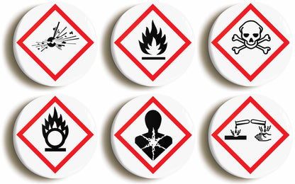 A picture of a set of six badges