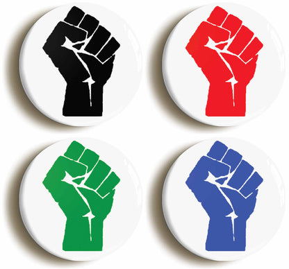 A picture of a set of four badges