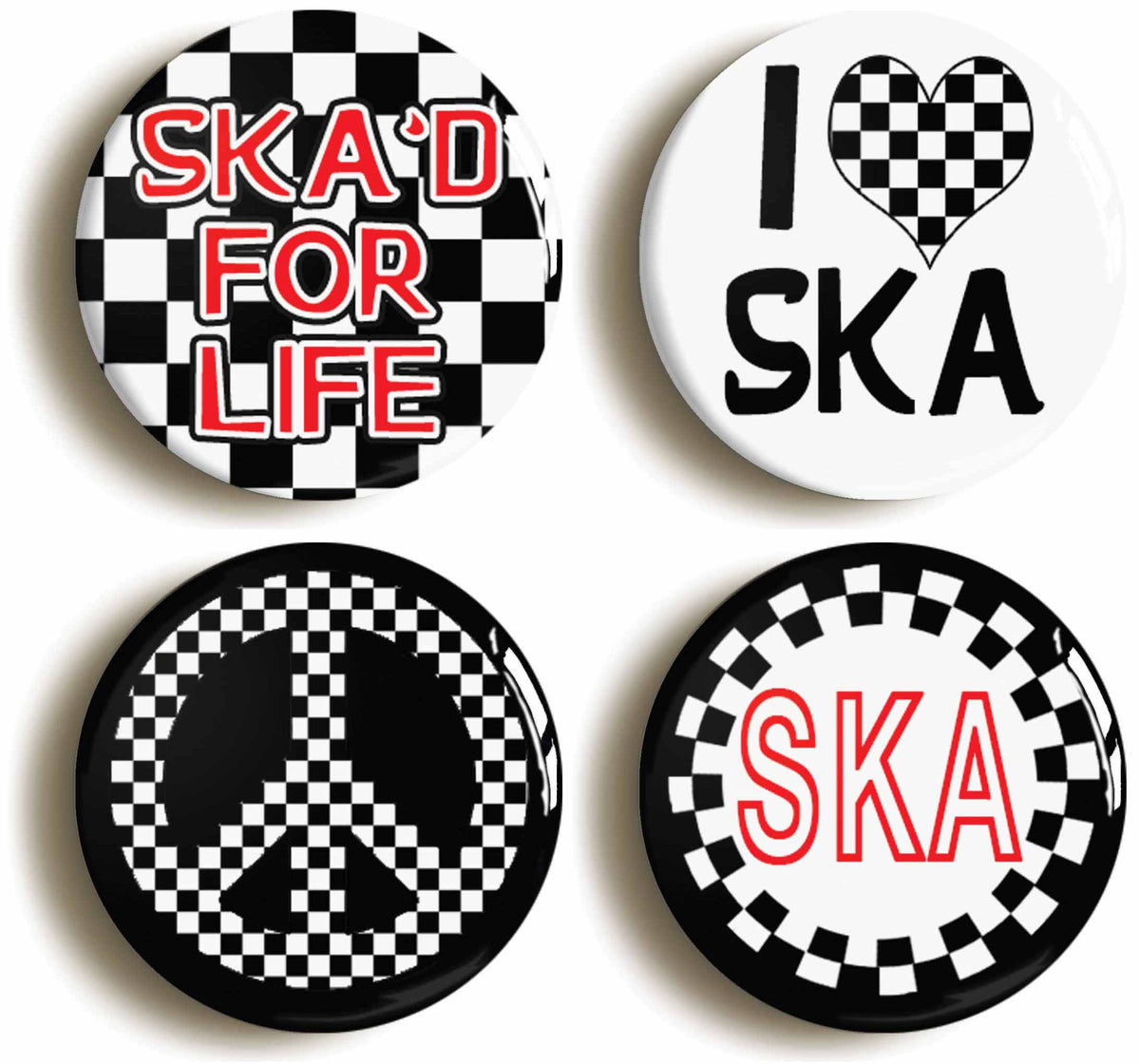 A picture of a set of four badges