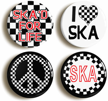 A picture of a set of four badges