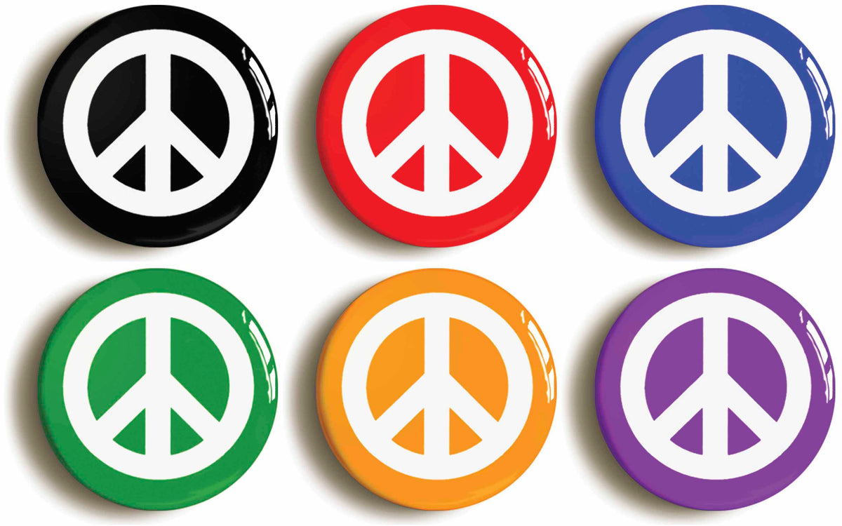 A picture of a set of six badges