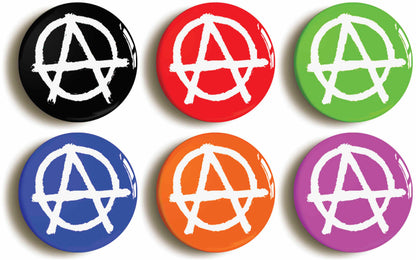 A picture of a set of six badges