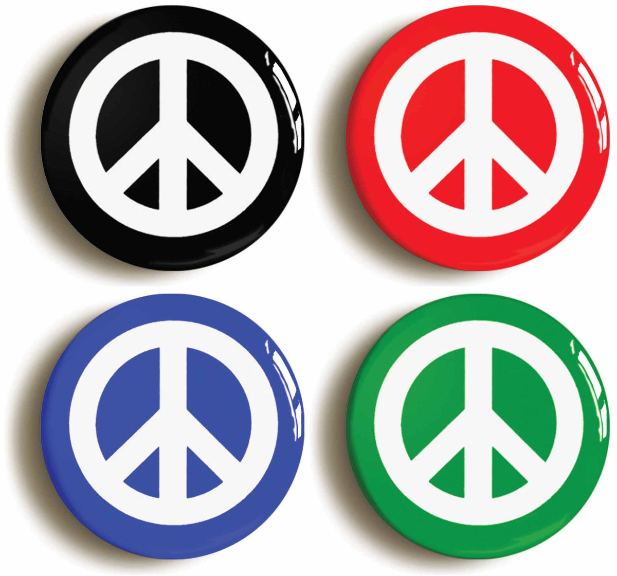 A picture of a set of four badges
