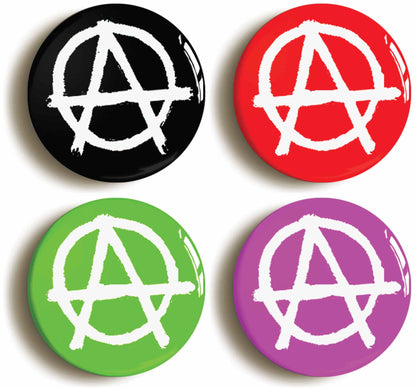 A picture of a set of four badges