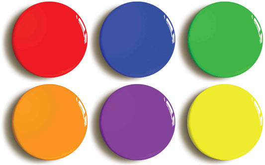 A picture of a set of six badges