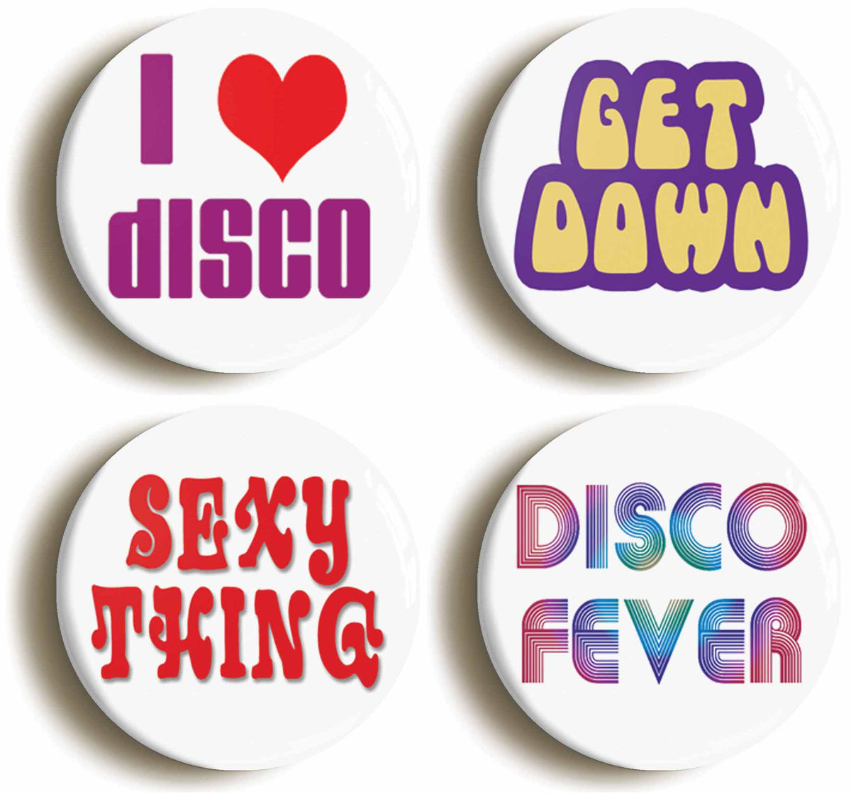 A picture of a set of four badges