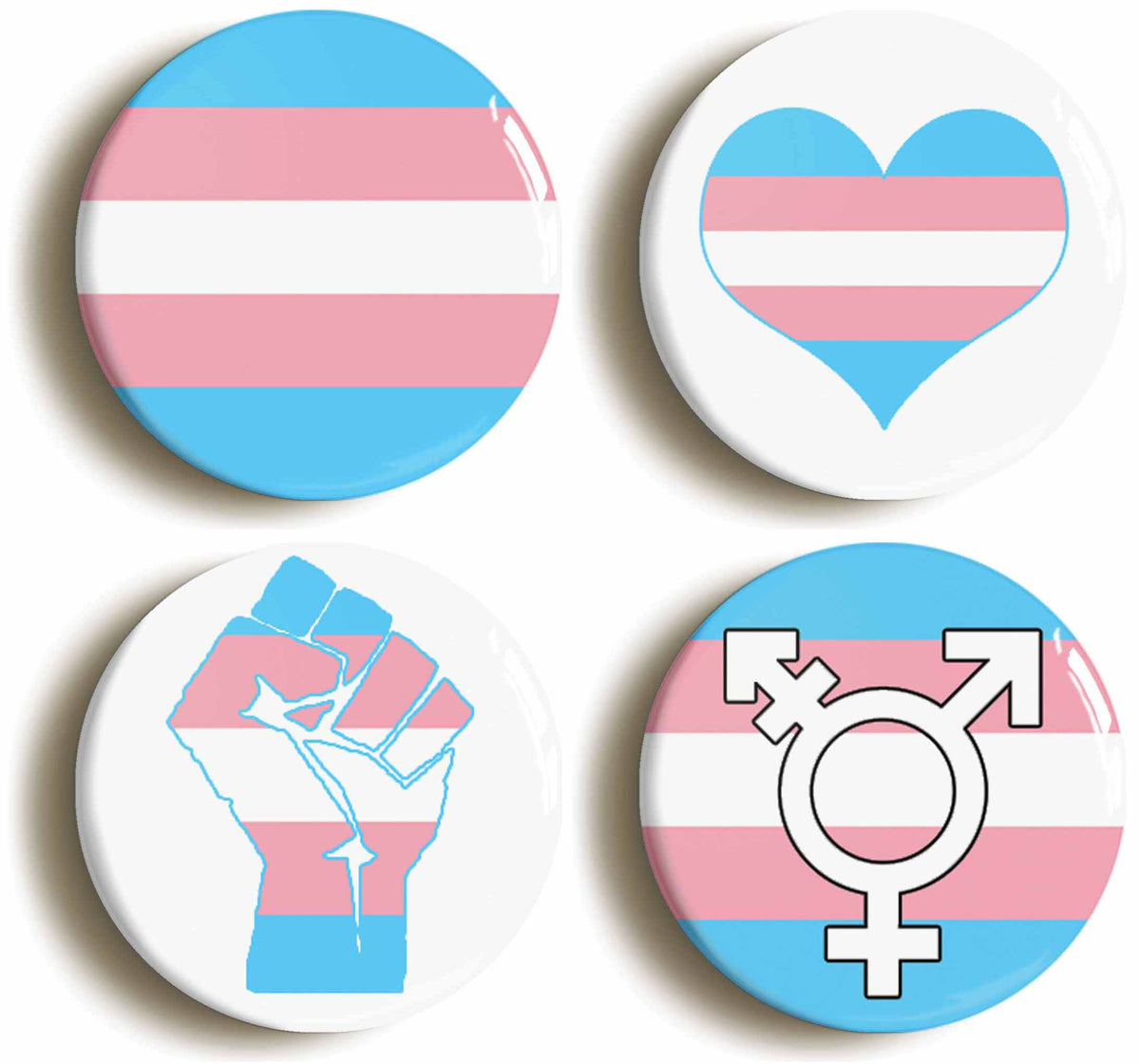 A picture of a set of four badges
