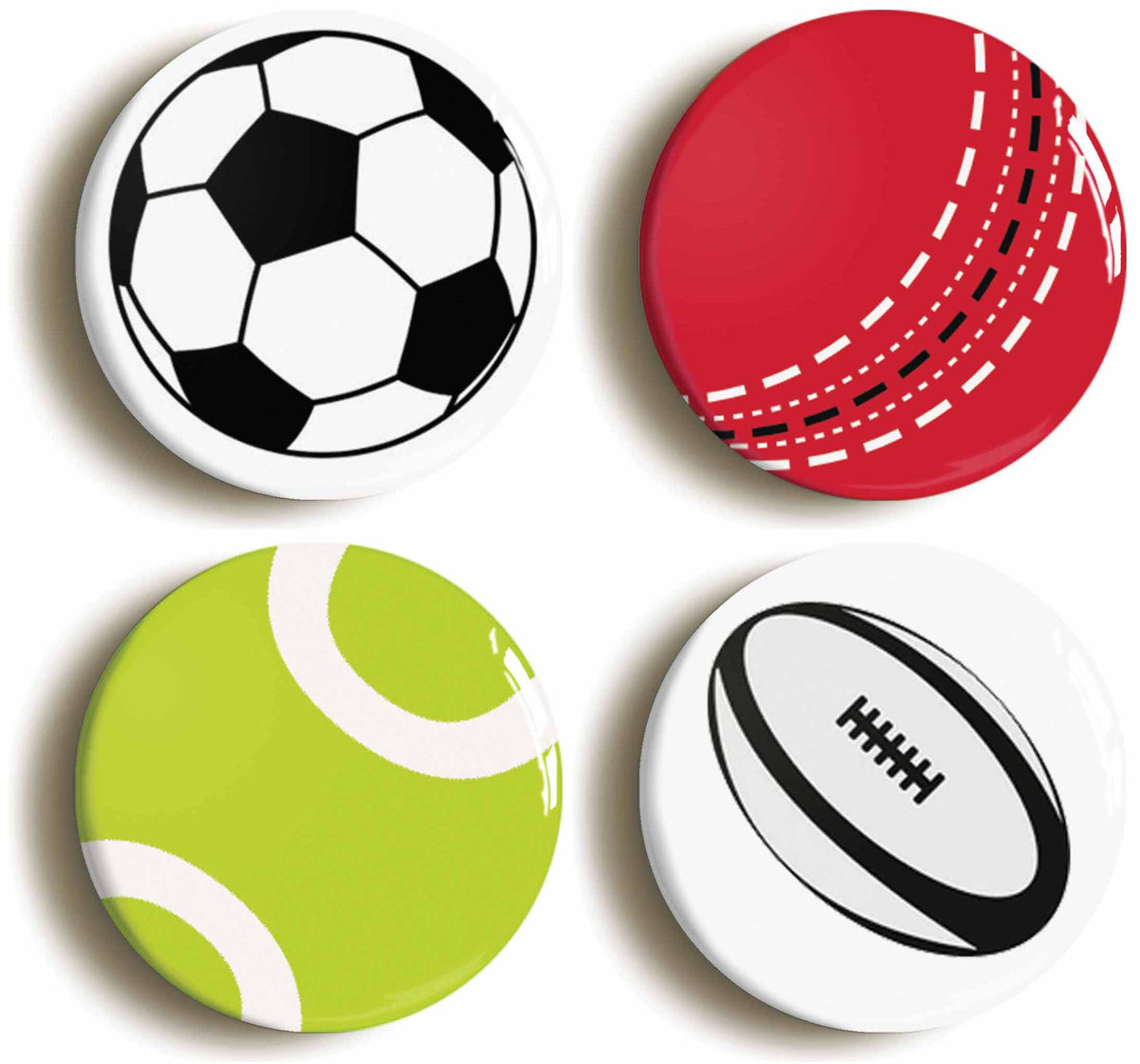 A picture of a set of four badges