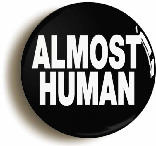 A picture of the front of the product, titled Almost Human Alien Funny Joke Button Pin Badge