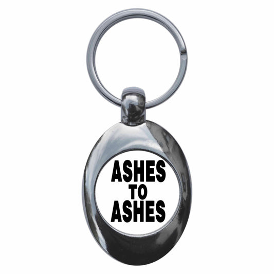 A picture of the front of the product, titled Ashes To Ashes Metal Keyring With Trolley Coin