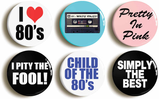 A picture of a set of six badges
