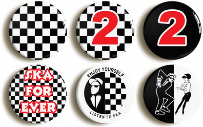 A picture of a set of six badges