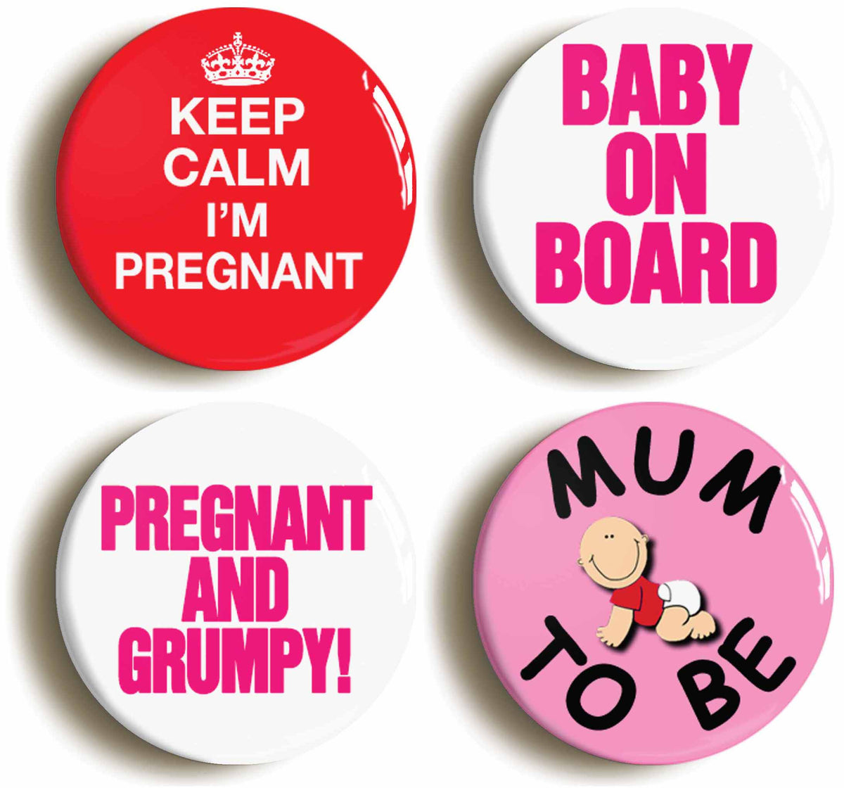 A picture of a set of four badges