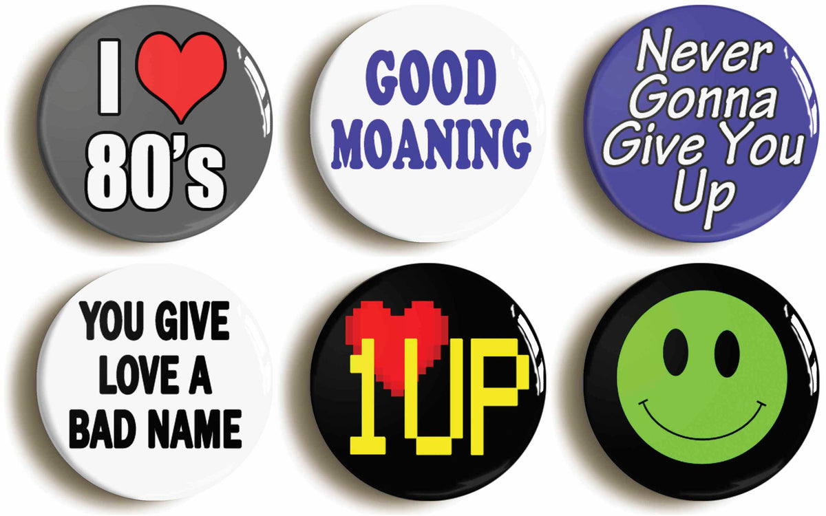 A picture of a set of six badges