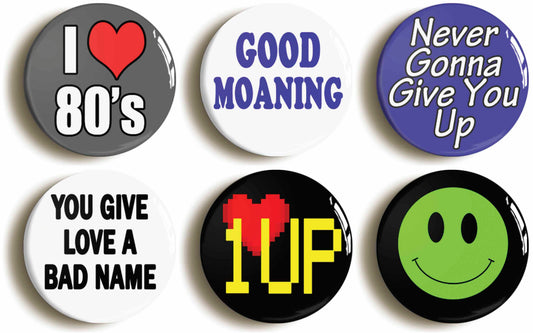 A picture of a set of six badges