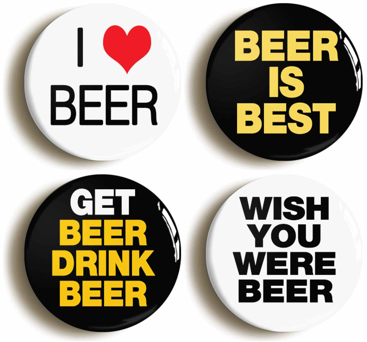 A picture of a set of four badges