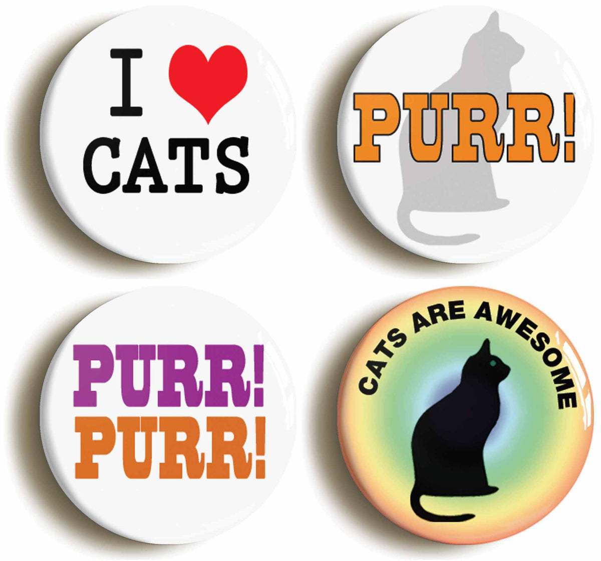 A picture of a set of four badges