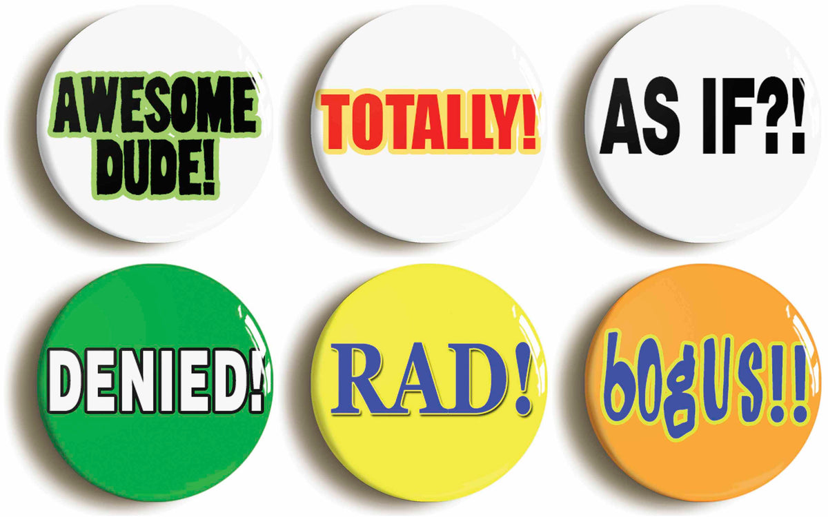 A picture of a set of six badges
