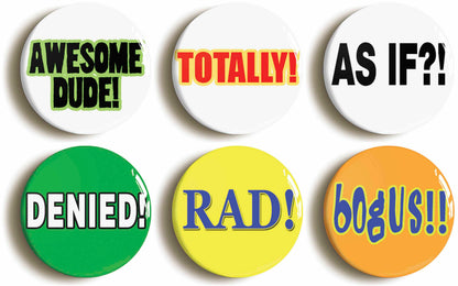 A picture of a set of six badges