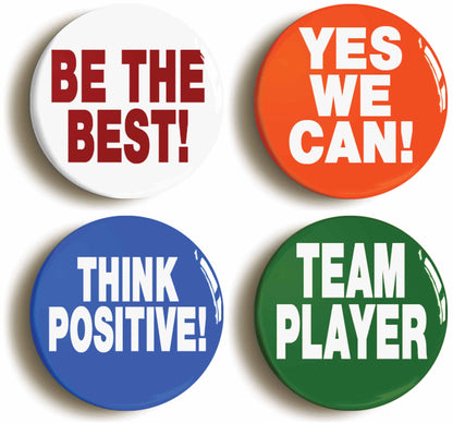 A picture of a set of four badges