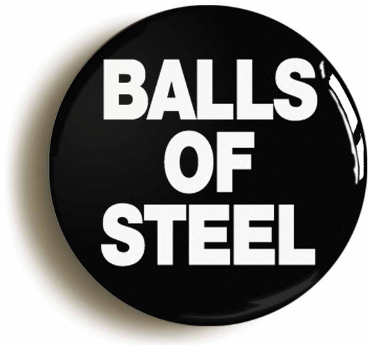 A picture of the front of the product, titled Balls Of Steel Funny Joke Super Man Button Pin Badge
