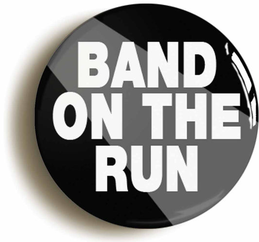 A picture of the front of the product, titled Band On The Run Button Pin Badge