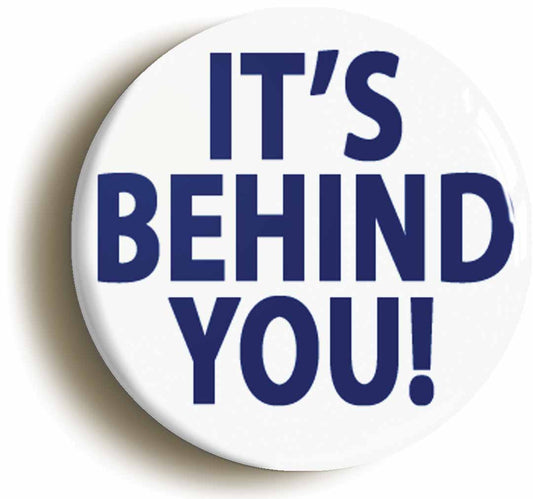 A picture of the front of the product, titled Its Behind You Funny Button Pin Badge