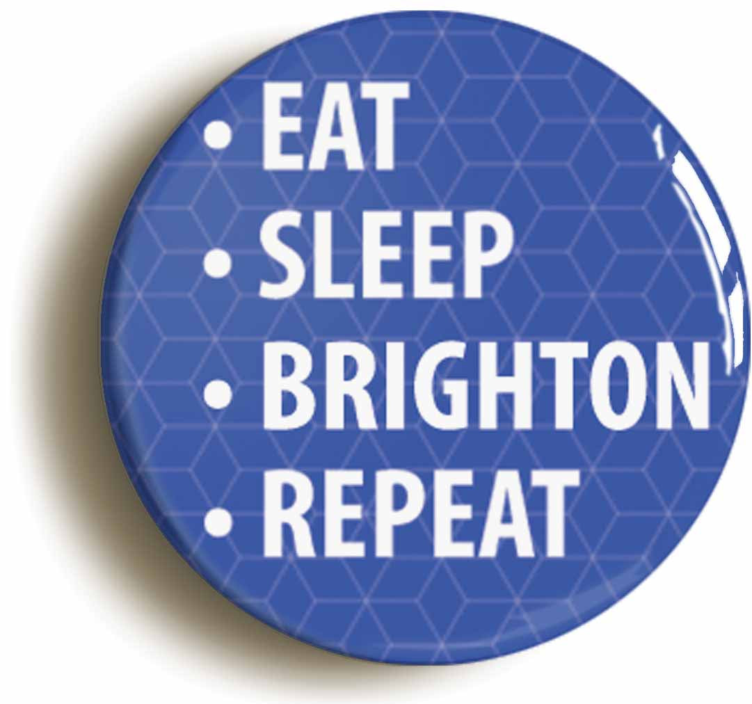 A picture of the front of the product, titled Eat Sleep Brighton Repeat Button Pin Badge