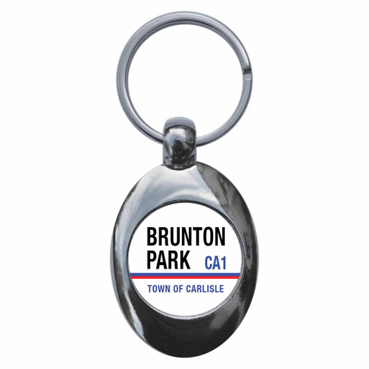 A picture of the front of the product, titled Brunton Park CA1 Carlisle Road Sign Metal Keyring With Trolley Coin