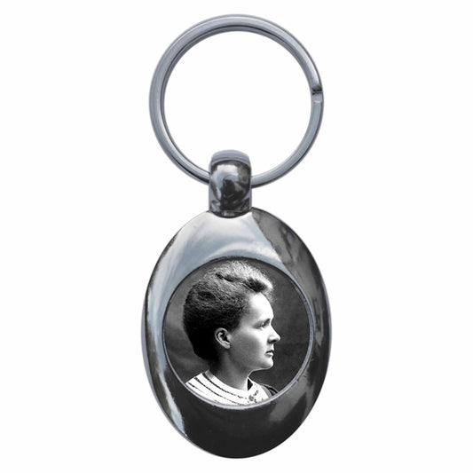 A picture of the front of the product, titled Scientist Marie Curie Metal Keyring With Trolley Coin