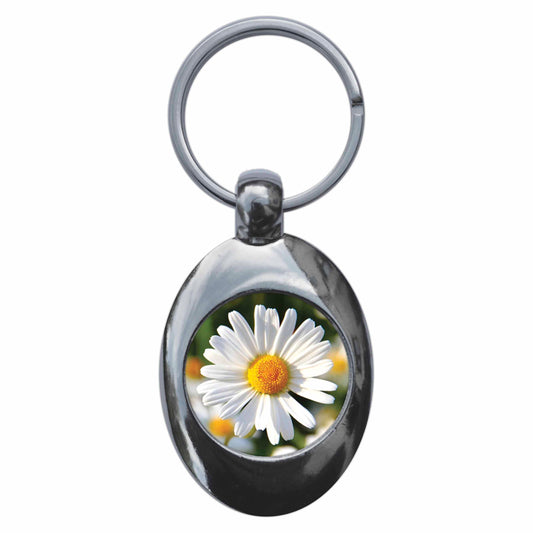 A picture of the front of the product, titled Daisy Flower Metal Keyring With Trolley Coin