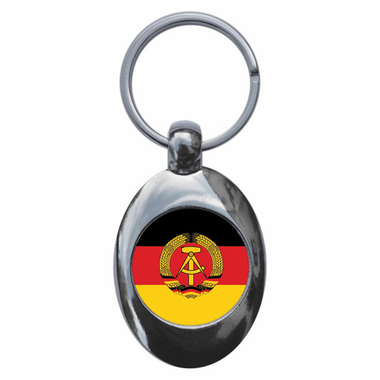 A picture of the front of the product, titled East Germany GDR National Flag Metal Keyring With Trolley Coin