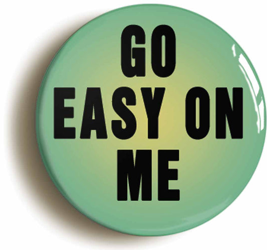 A picture of the front of the product, titled Go Easy On Me Button Pin Badge