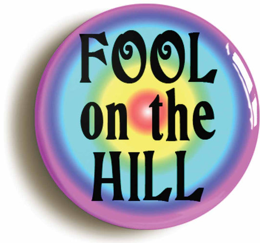 A picture of the front of the product, titled Fool On The Hill Sixties Hippie Psychedelic Button Pin Badge